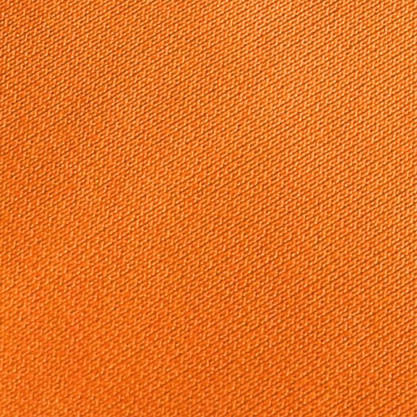 Detalle tejido polo de golf modelo draw junior naranja