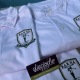 Polos blancos personalizados con el escudo de Barna Golf Club